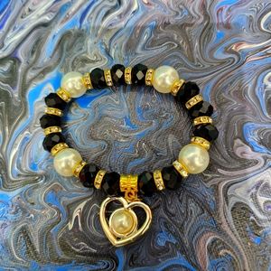 Black, white, and gold bracelet